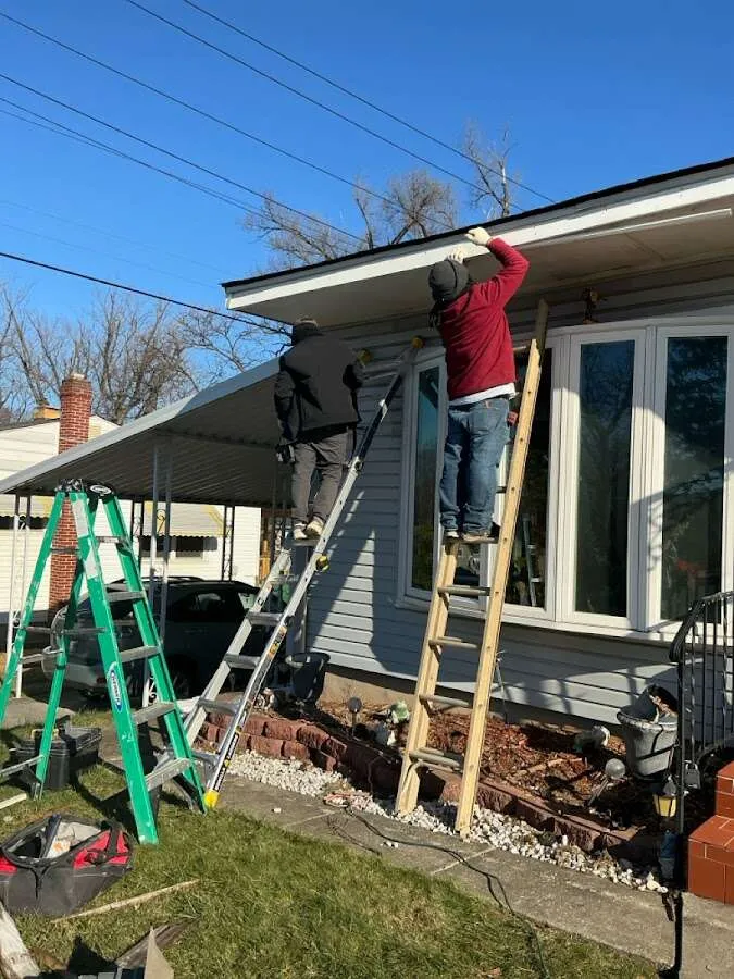 Restoration crew performing exterior repair in Morehead City